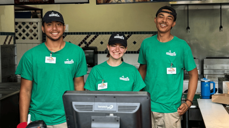 Family in front of wave pool